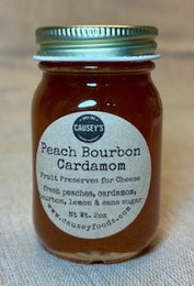 peach bourbon cardamom fruit preserves in a glass jar 2oz