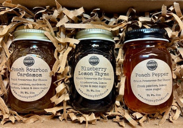 gourmet gift box with blueberry lemon thyme peach bourbon cardamom and peach pepper