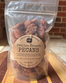 Small batch praline crunch pecans in an 8 oz bag made with locally sourced Georgia pecans from Vienna, Georgia